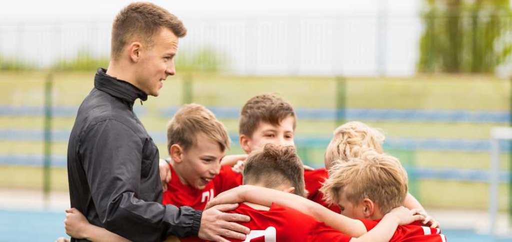 Coach & team huddle.
