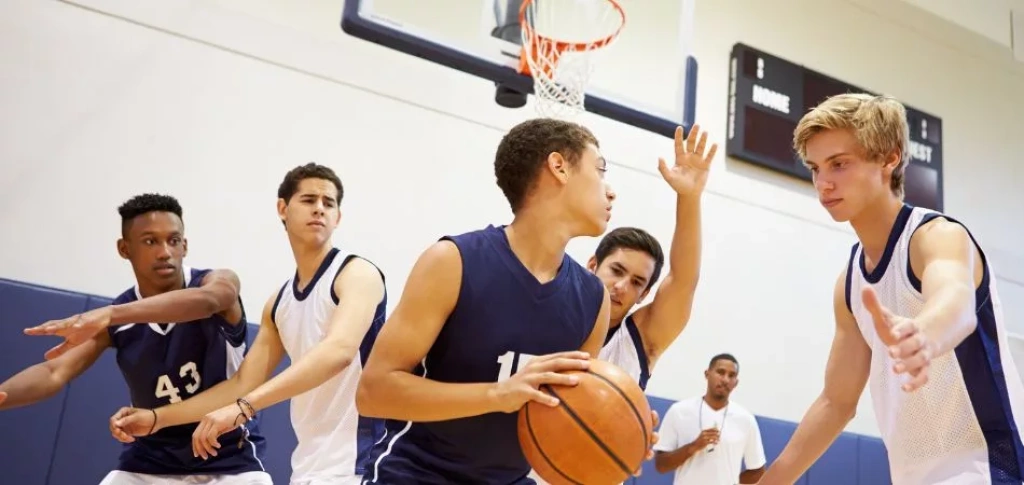 Basketball player about to make a pass.