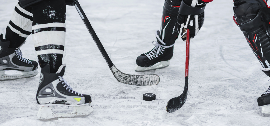 Hockey players face off.
