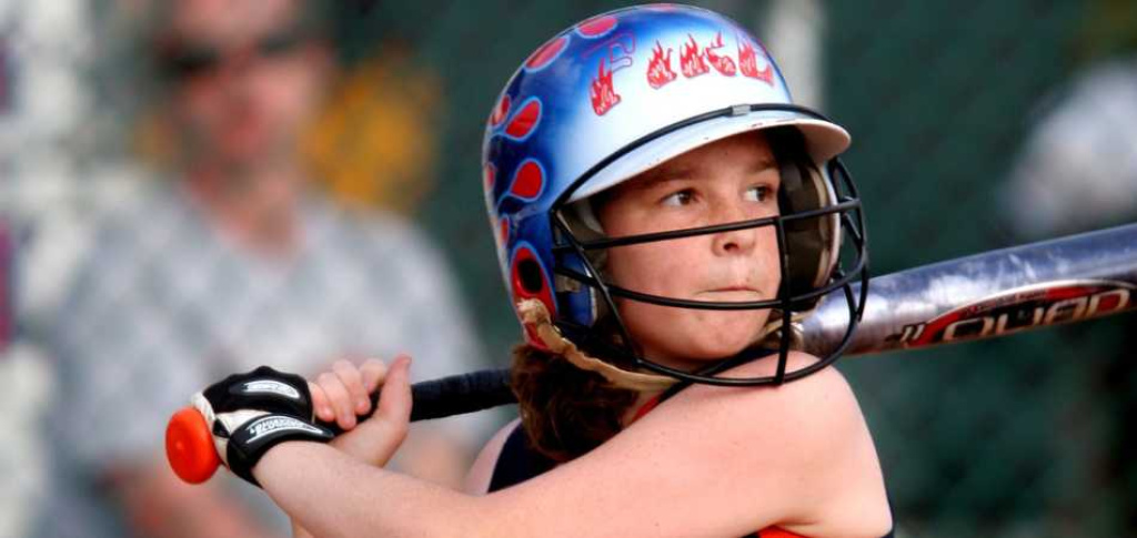 Youth softball batter close up.
