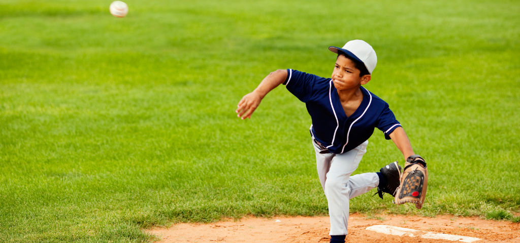 Baseball player making a throw.