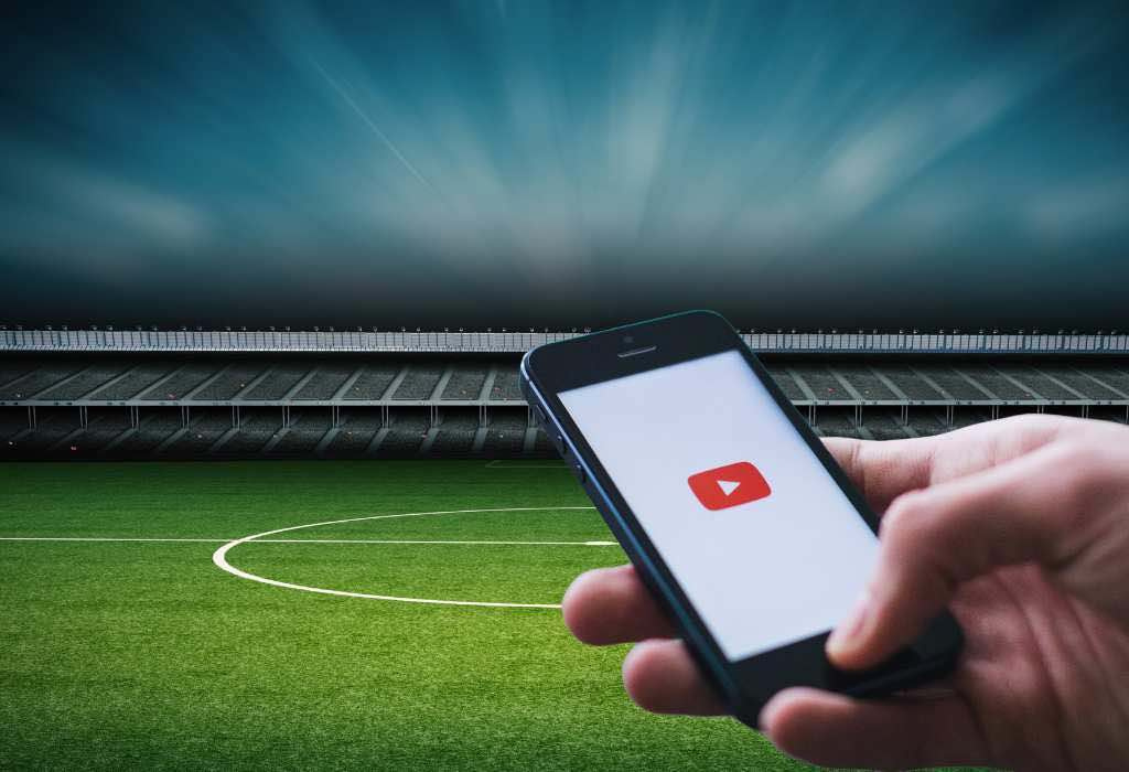 YouTube app on soccer field.