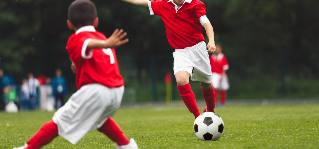 Soccer ball passing on field.